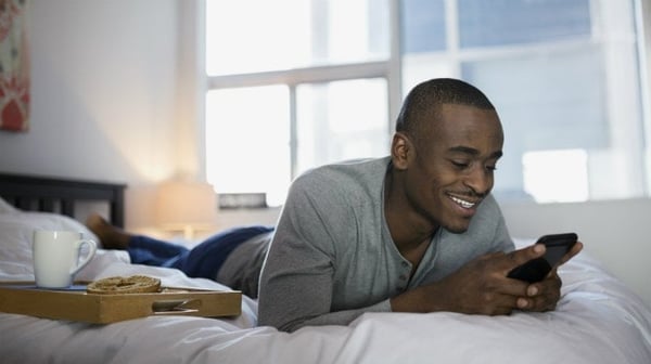 Man lying on bed