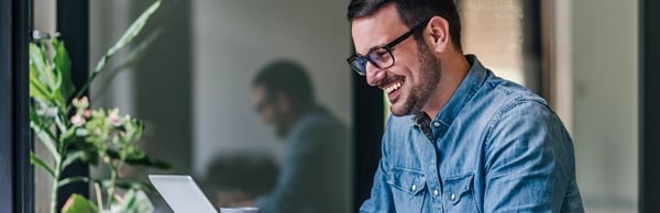 Man sat at laptop