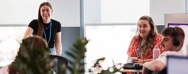 Colleagues chatting in the office