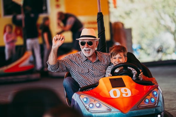 Grandad and grandson in dodgem