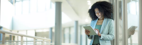 Woman staring at tablet