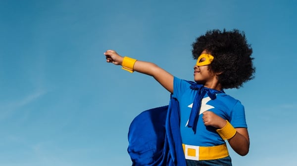 Child dressed up in super hero costume