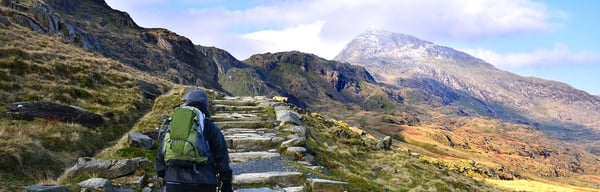 Hill walker and beautiful mountainous scenery