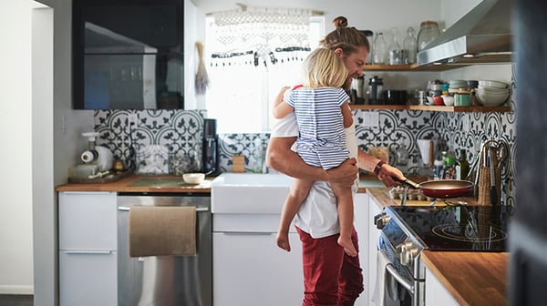 Man cooking with child