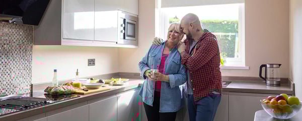 Woman and man in kitchen