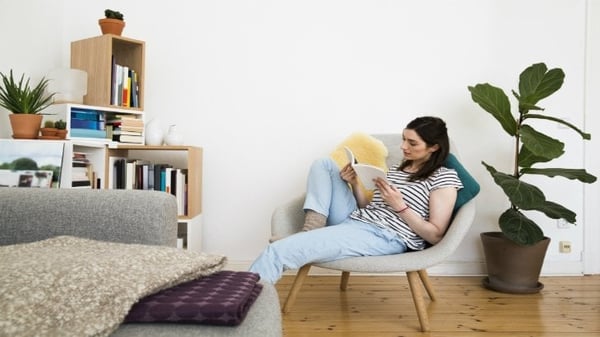 Woman reading policy