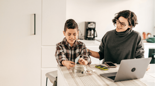 woman and boy doing maths