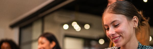 Young lady on her phone in cafe