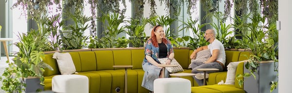 office workers sitting on sofa