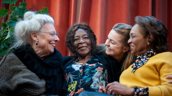 A group of smiling older ladies