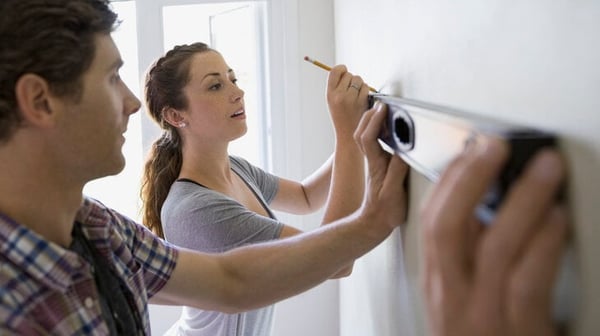 Young people working on whiteboard