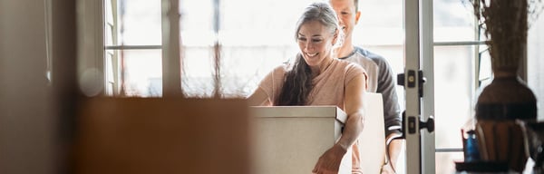 Woman carrying a box
