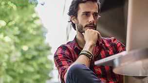 Man staring at laptop
