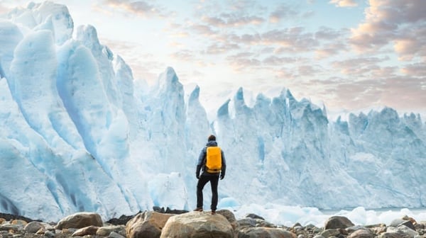 Person in front of glacier