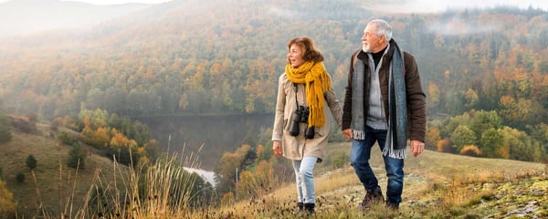 Older couple walking in the countryside