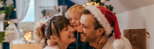 Mother, father and young son at Christmas time
