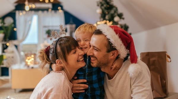 Mother, father and young son at Christmas time
