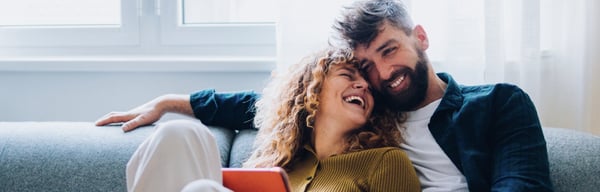 Young couple sitting on the sofa