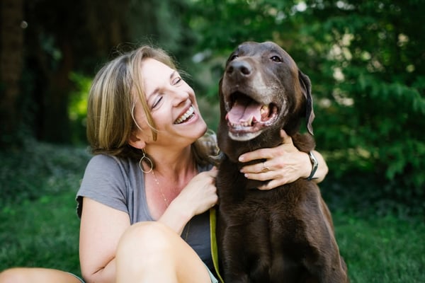 Woman smiling with dog