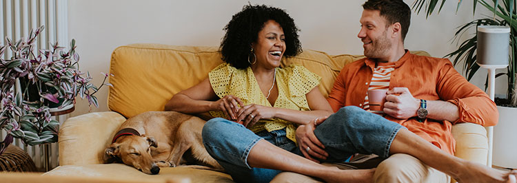 Couple sitting on sofa