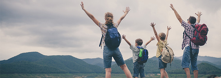 Family cheering over landscape