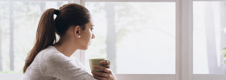 Woman staring out the window