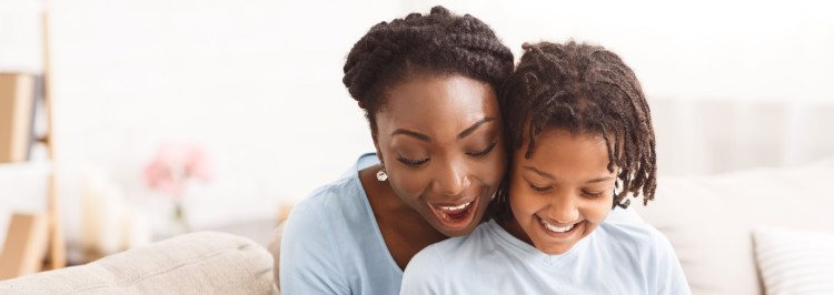 Mother and child with piggy bank