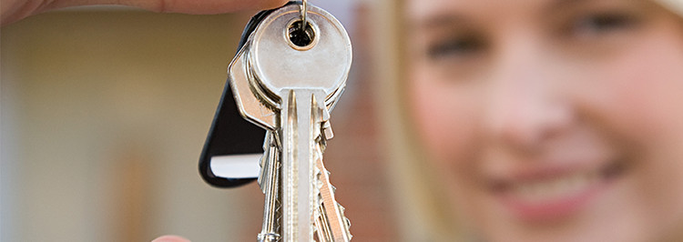 Woman holding house keys