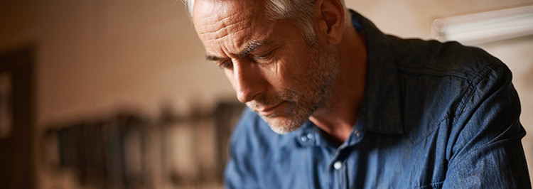 Man drawing in workshop