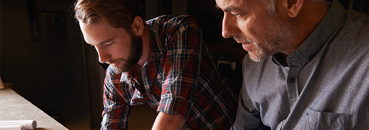 Father and son in workshop