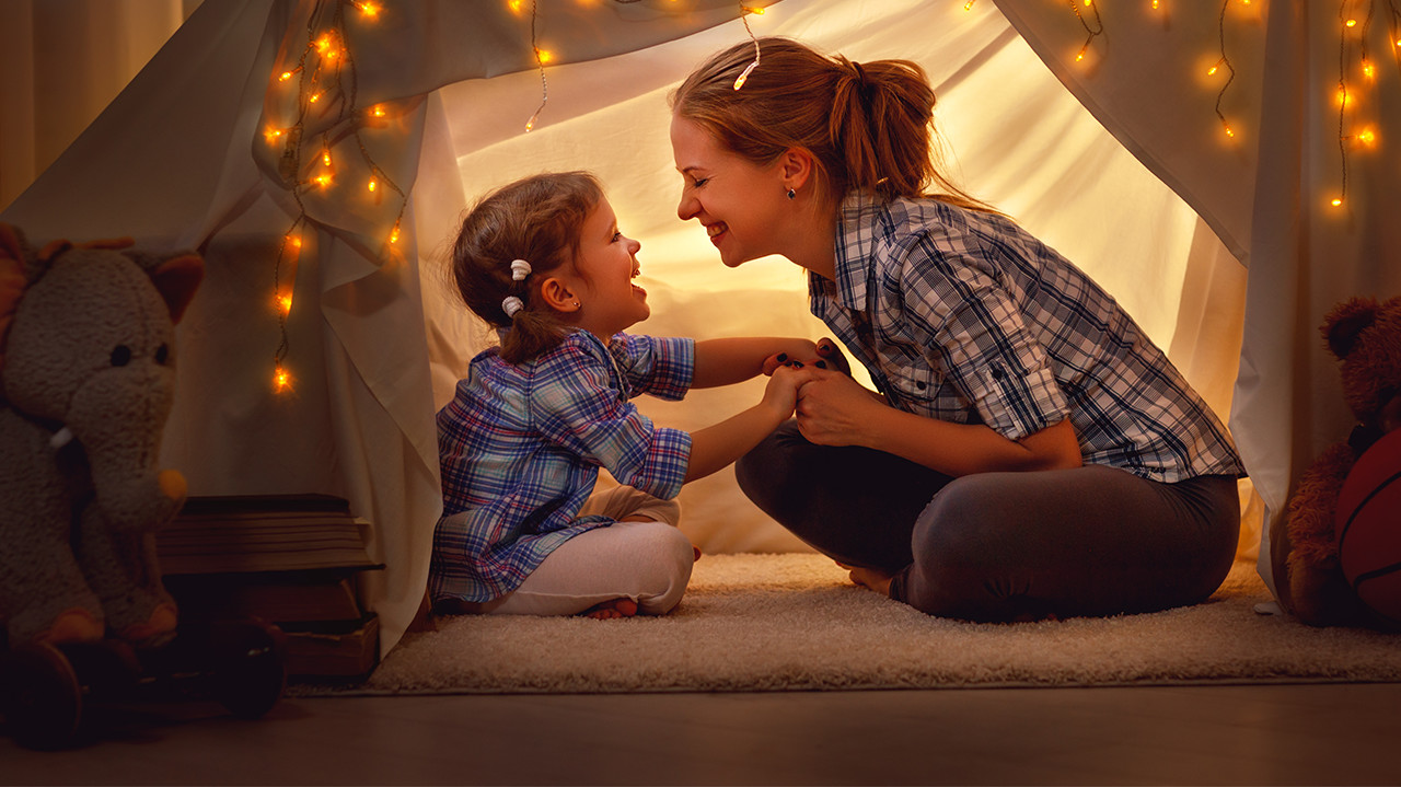 mother and daughter in tent at home_Banner_Block_1280px
