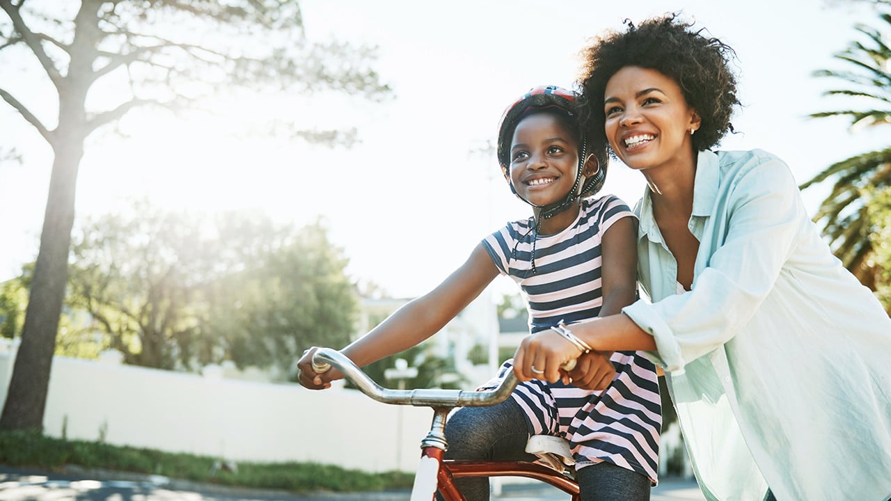 mother with daughter on bicycle_Banner_Block_1280px