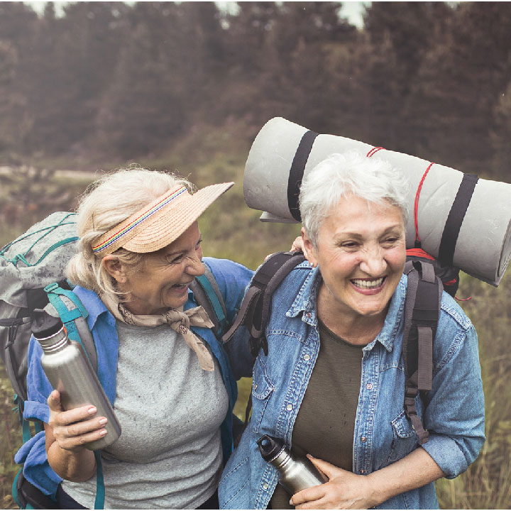 Two older women hiking together