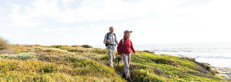 Older couple out walking in nature