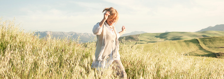 woman running in field_Feature_box_with_image_750px