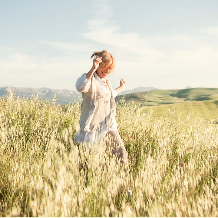 woman running in field_square&circle_720px