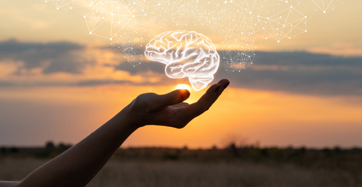 Mystical brain in palm of hand