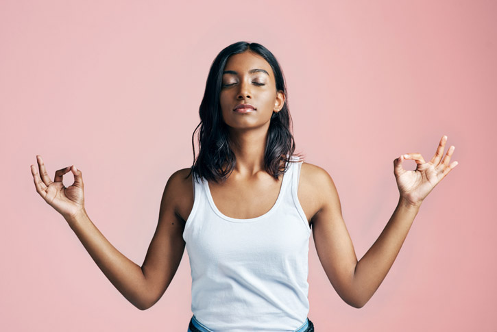 stretching_girl_in_yoga_pose_holding_article_teaser