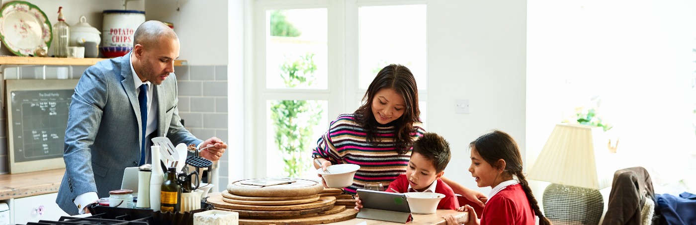 family-in-kitchen-eating-breakfast