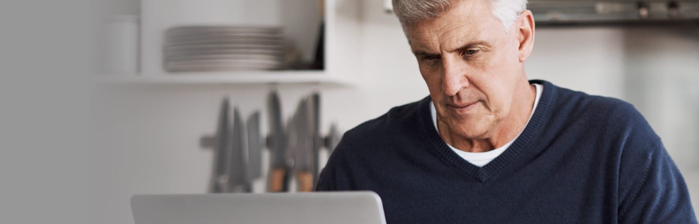 Man looking at laptop