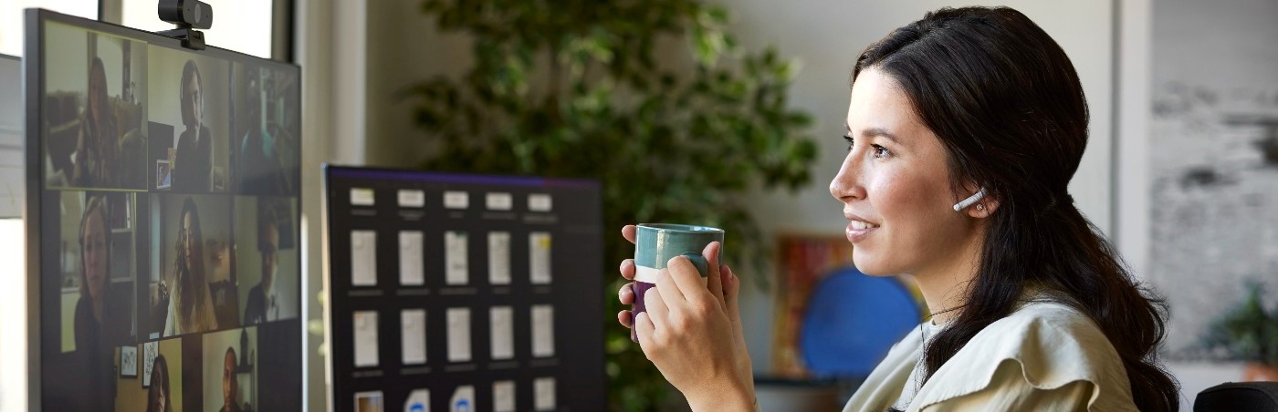 woman sat at desk on computer