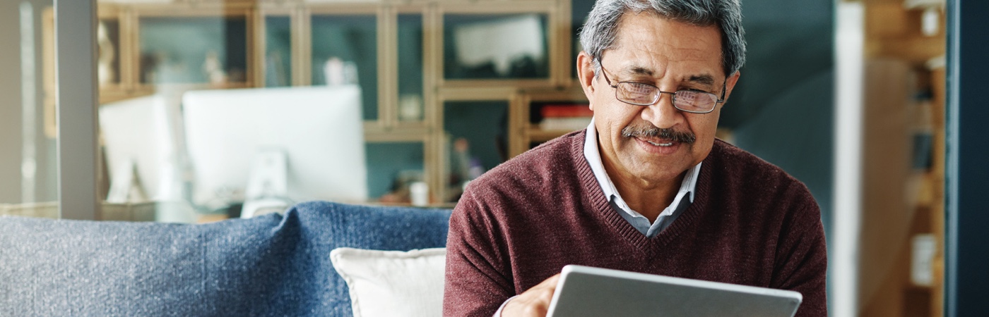 Man looking at tablet