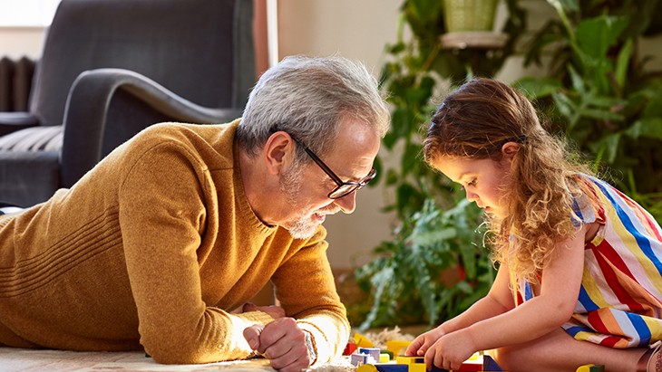 Father and daughter playing together