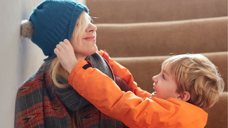 Woman holding toddler