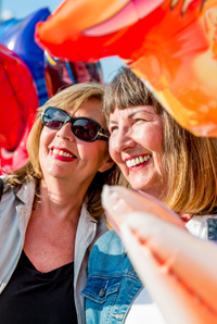 Taking a selfie with balloons