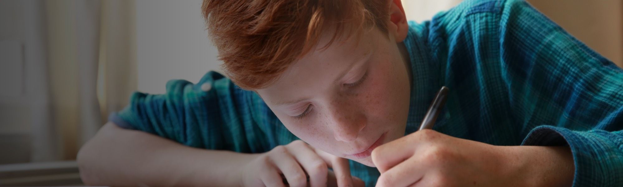Boy writing