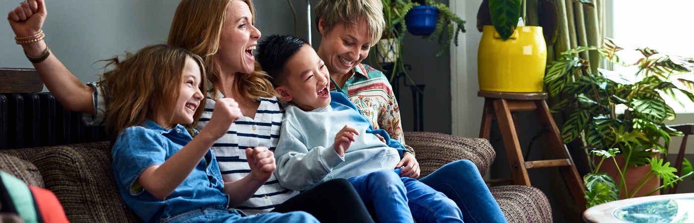 family sitting and laughing together