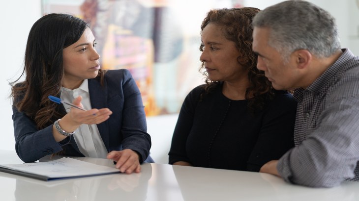 Senior couple discussing a will