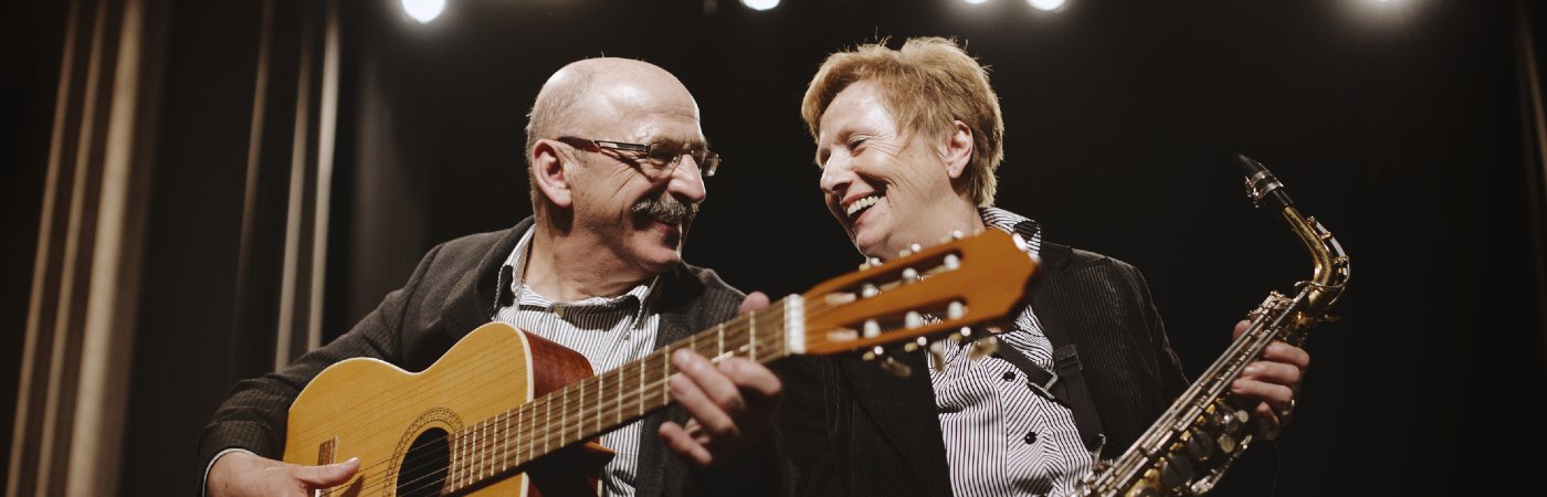 Couple enjoying playing music together