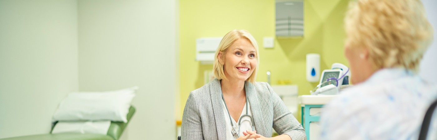 Female GP with her patient